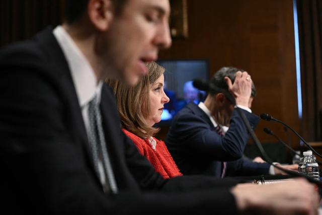 US Federal Reserve Vice Chair for Supervision Michelle Bowman (C) testifies during a Senate Committee on Banking, Housing, and Urban Affairs hearing titled "Update from the Prudential Regulators: Rightsizing Regulation to Promote American Opportunity," on Capitol Hill in Washington, DC on February 26, 2026. (Photo by Brendan SMIALOWSKI / AFP)