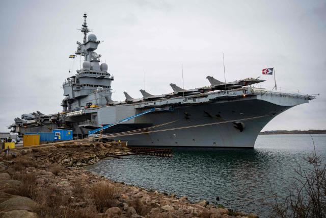 A picture taken on February 25, 2026, shows the French aircraft carrier Charles De Gaulle (R91) during a media tour while moored at the quay of the North Port in Malmo, Sweden. (Photo by Johan NILSSON / TT NEWS AGENCY / AFP) / Sweden OUT