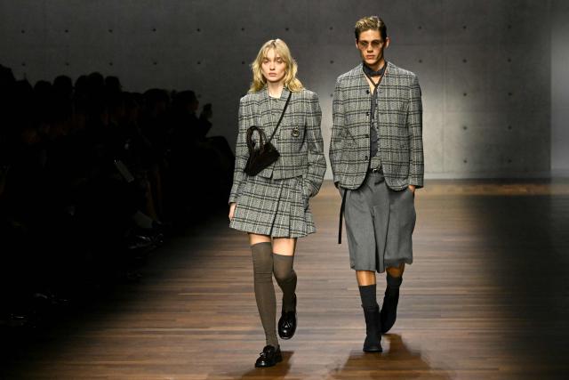 Models present creations during the Armani fashion show as part of the Milan Fashion Week Womens-Mens collection Fall-Winter 2026-2027, in Milan on February 26, 2026. (Photo by Andreas SOLARO / AFP)