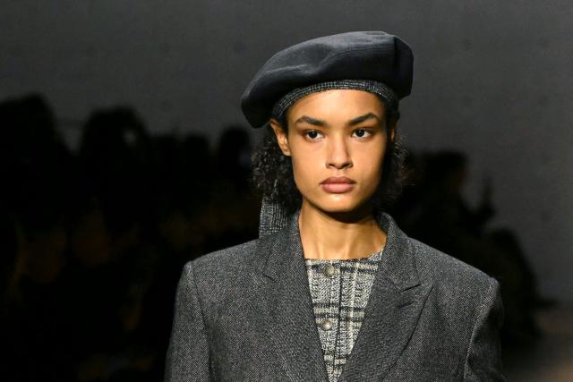 A model presents a creation during the Armani fashion show as part of the Milan Fashion Week Womens-Mens collection Fall-Winter 2026-2027, in Milan on February 26, 2026. (Photo by Andreas SOLARO / AFP)