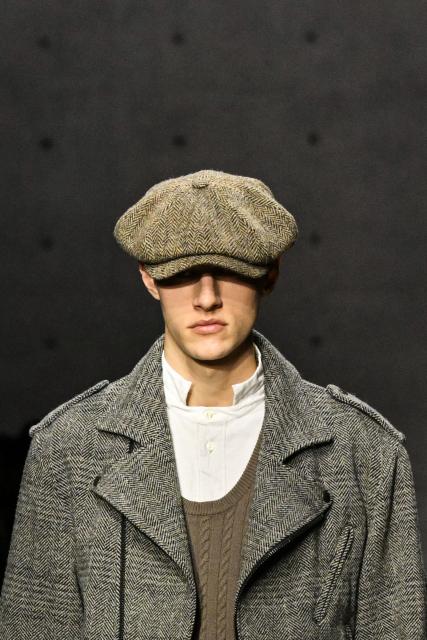 A model presents a creation during the Armani fashion show as part of the Milan Fashion Week Womens-Mens collection Fall-Winter 2026-2027, in Milan on February 26, 2026. (Photo by Andreas SOLARO / AFP)