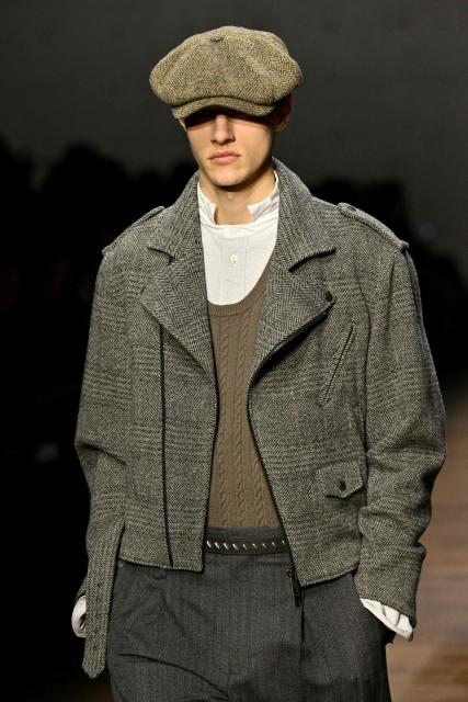 A model presents a creation during the Armani fashion show as part of the Milan Fashion Week Womens-Mens collection Fall-Winter 2026-2027, in Milan on February 26, 2026. (Photo by Andreas SOLARO / AFP)