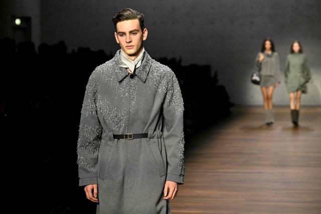 Models present creations during the Armani fashion show as part of the Milan Fashion Week Womens-Mens collection Fall-Winter 2026-2027, in Milan on February 26, 2026. (Photo by Andreas SOLARO / AFP)