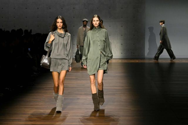Models present creations during the Armani fashion show as part of the Milan Fashion Week Womens-Mens collection Fall-Winter 2026-2027, in Milan on February 26, 2026. (Photo by Andreas SOLARO / AFP)