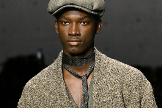 A model presents a creation during the Armani fashion show as part of the Milan Fashion Week Womens-Mens collection Fall-Winter 2026-2027, in Milan on February 26, 2026. (Photo by Andreas SOLARO / AFP)