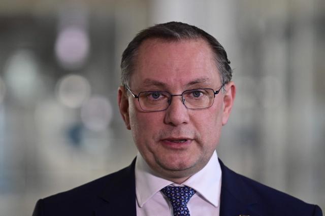 Co-leader of the far-right Alternative for Germany (AfD) party Tino Chrupalla gives a statement after a court ruled that his party cannot be labeled as "confirmed right-wing extremist" group, at the Bundestag (lower house of parliament) in Berlin on February 26, 2026. (Photo by John MACDOUGALL / AFP)