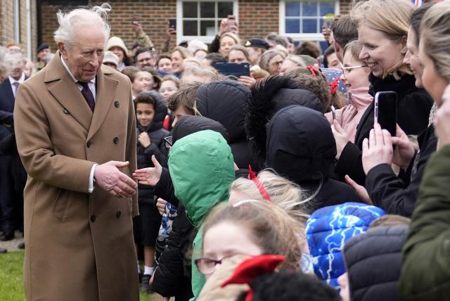 Britain's King Charles III meets with serving personnel from the 7th Air Defence Group Royal Artillery, and members of their families, during a visit to Baker Barracks in Emsworth, southern England on February 26, 2026. (Photo by Andrew Matthews / POOL / AFP)