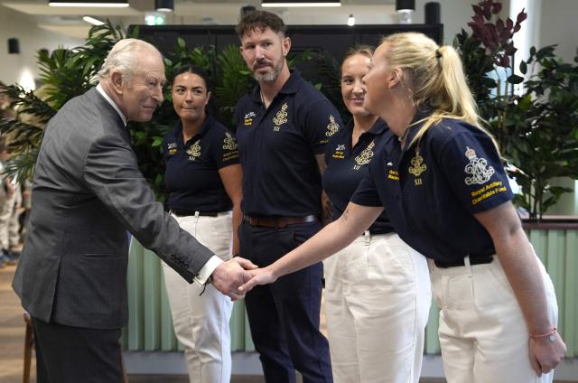 Britain's King Charles III meets with members of Force Atlantic rowing team during a visit to the 7th Air Defence Group Royal Artillery at Baker Barracks in Emsworth, southern England on February 26, 2026. (Photo by Andrew Matthews / POOL / AFP)