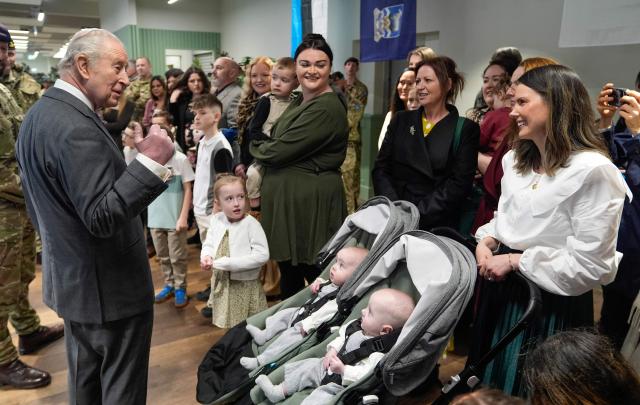 Britain's King Charles III meets with families of personnel from the 7th Air Defence Group Royal Artillery to Baker Barracks in Emsworth, southern England on February 26, 2026. (Photo by Andrew Matthews / POOL / AFP)