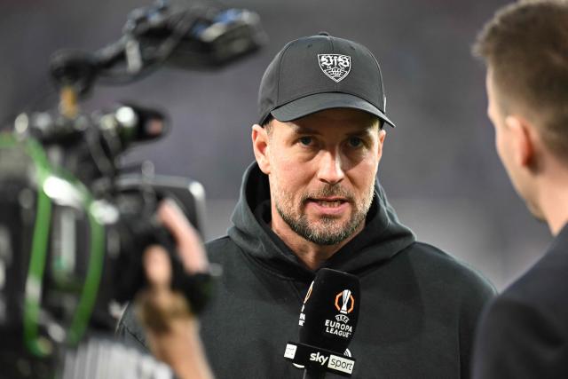 Stuttgart's German head coach Sebastian Hoeness (C) speaks to the media prior to the start of the UEFA Europa League knockout round playoff second leg football match VfB Stuttgart v Celtic in Stuttgart, southern Germany, on February 26, 2026. (Photo by THOMAS KIENZLE / AFP)