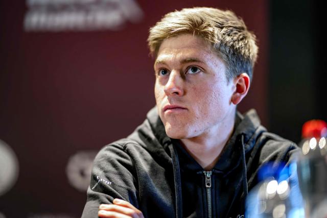 Belgium's Jenno Berckmoes of Lotto-Intermarche gives a press conference of the Lotto-Intermarche cycling team ahead of the Omloop Het Nieuwsblad, the opening race of the Flemish classic one-day races season, in Sint-Martens-Latem, on February 26, 2026. (Photo by DAVID PINTENS / Belga / AFP) / Belgium OUT