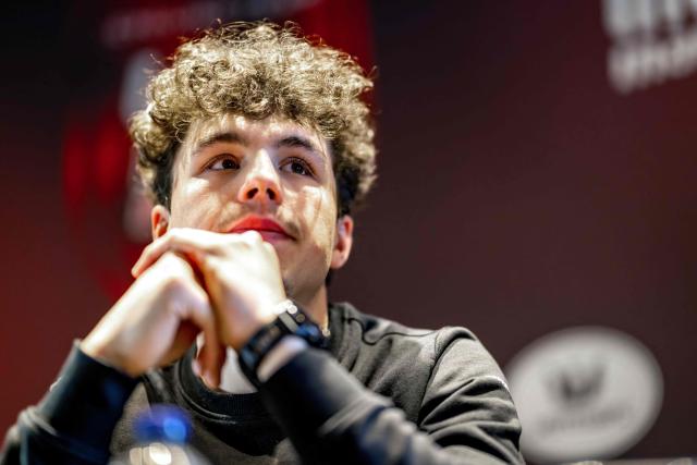 Belgium's Arnaud De Lie of Lotto-Intermarche  gives a press conference of the Lotto-Intermarche cycling team ahead of the Omloop Het Nieuwsblad, the opening race of the Flemish classic one-day races season, in Sint-Martens-Latem, on February 26, 2026. (Photo by DAVID PINTENS / Belga / AFP) / Belgium OUT