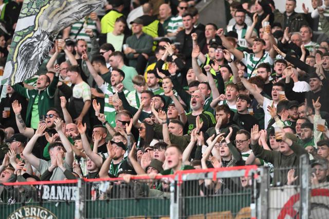 Celtic supporters cheer prior to the start of the UEFA Europa League knockout round playoff second leg football match VfB Stuttgart v Celtic in Stuttgart, southern Germany, on February 26, 2026. (Photo by THOMAS KIENZLE / AFP)