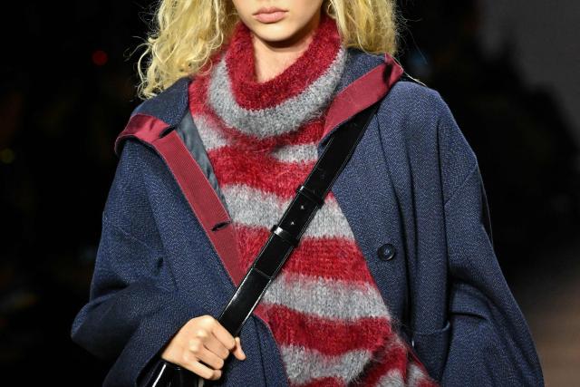 A model presents a creation during the Armani fashion show as part of the Milan Fashion Week Womens-Mens collection Fall-Winter 2026-2027, in Milan on February 26, 2026. (Photo by Andreas SOLARO / AFP)