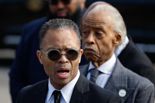 (L/R) Jessie Jackson Jr. and Rev. Al Sharpton speak to the media as they arrive at the Rainbow PUSH Coalition headquarters as US civil rights leader Jesse Jackson lies in repose inside the building in Chicago, Illinois, on February 26, 2026. Veteran US civil rights activist Reverend Jesse Jackson, one of the nation's most influential Black voices, died earlier this month at the age of 84. Jackson, a Baptist minister, had been a civil rights leader since the 1960s, when he marched with Martin Luther King Jr. and helped fundraise for the cause. (Photo by KAMIL KRZACZYNSKI / AFP)