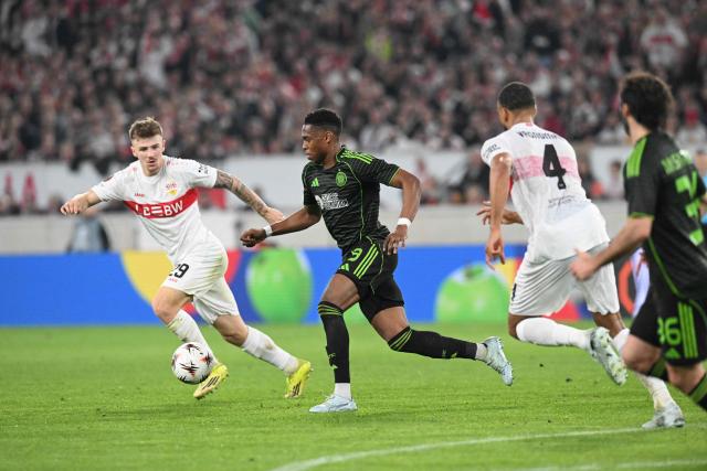 Stuttgart's German defender #29 Finn Jeltsch (L) and Celtic's Austrian forward #09 Junior Adamu vie for the ball during the UEFA Europa League knockout round playoff second leg football match VfB Stuttgart v Celtic in Stuttgart, southern Germany, on February 26, 2026. (Photo by THOMAS KIENZLE / AFP)