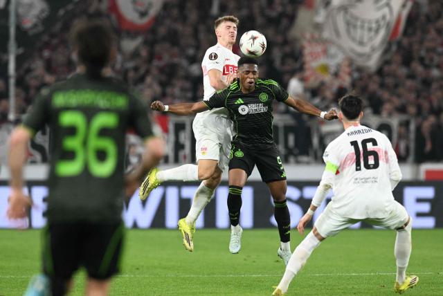 Stuttgart's German defender #29 Finn Jeltsch (L) and Celtic's Austrian forward #09 Junior Adamu vie for the ball during the UEFA Europa League knockout round playoff second leg football match VfB Stuttgart v Celtic in Stuttgart, southern Germany, on February 26, 2026. (Photo by THOMAS KIENZLE / AFP)