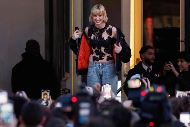 Belgian singer Angele appears on the square de la Monnaie in Brussels on February 26, 2026 to showcase on the eve of the release of her new song "What You Want". (Photo by BENOIT DOPPAGNE / BELGA / AFP) / Belgium OUT