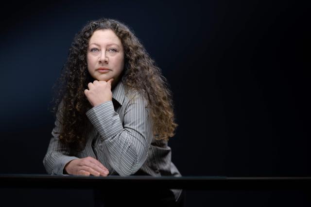 Rachael Louw, a former employee of late Salah Fayed, brother of late Egyptian businessman Mohamed Al-Fayed, poses during a photo session in Paris on February 9, 2026. French authorities have begun investigating the late Egyptian businessman Mohamed Al-Fayed and his brother Salah in the summer of 2025amid allegations of a vast system of sex trafficking and abuse on French soil. (Photo by JOEL SAGET / AFP)