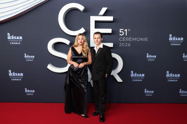 French actress Anja Verderosa (L) and French actor Felix Lefebvre pose on the red carpet upon arrival for the 51st edition of the Cesar Film Awards ceremony at the Olympia venue in Paris on February 26, 2026. (Photo by ALAIN JOCARD / AFP)