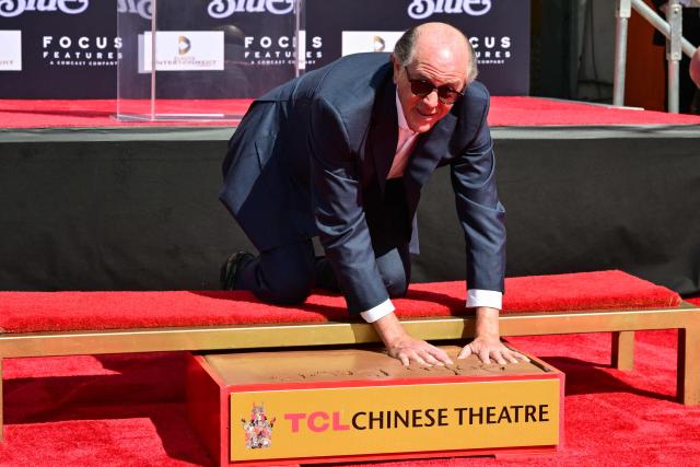US producer John Davis attends his hand and footprint ceremony at the TCL Chinese theatre in Hollywood, California on February 26, 2026. (Photo by Frederic J. Brown / AFP)