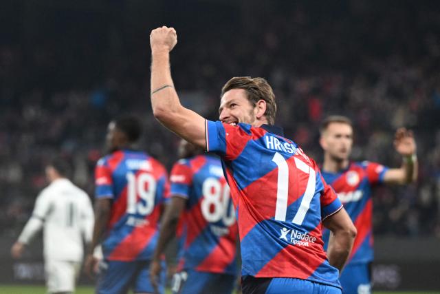Viktoria Plzen's Slovakian midfielder #17 Patrik Hrosovski celebrates the 1-1 during the UEFA Europa League knockout round playoff second leg football match FC Viktoria Plzen v Panathinaikos in Plzen, Czech Republic, on February 26, 2026. (Photo by Michal Cizek / AFP)