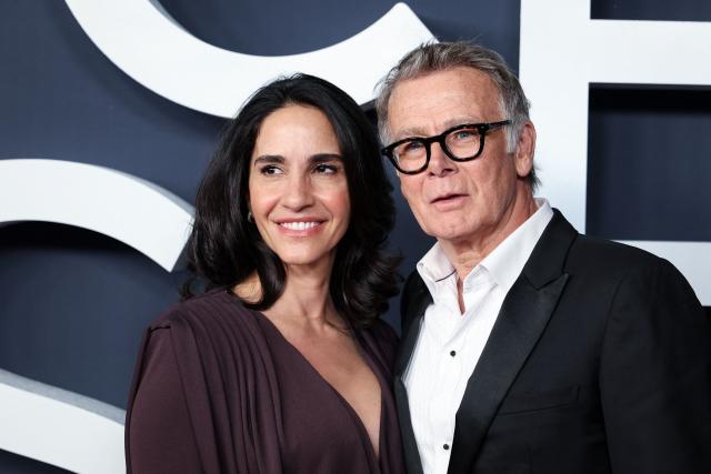 French actor Franck Dubosc (R) and his wife Daniele Dubosc pose on the red carpet upon arrival for the 51st edition of the Cesar Film Awards ceremony at the Olympia venue in Paris on February 26, 2026. (Photo by ALAIN JOCARD / AFP)