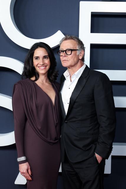 French actor Franck Dubosc (R) and his wife Daniele Dubosc pose on the red carpet upon arrival for the 51st edition of the Cesar Film Awards ceremony at the Olympia venue in Paris on February 26, 2026. (Photo by ALAIN JOCARD / AFP)
