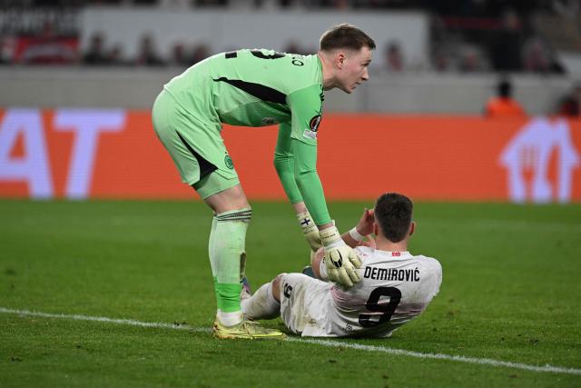 Stuttgart's Bosnian forward #09 Ermedin Demirovic reacts injured on the pitch during the UEFA Europa League knockout round playoff second leg football match VfB Stuttgart v Celtic in Stuttgart, southern Germany, on February 26, 2026. (Photo by THOMAS KIENZLE / AFP)