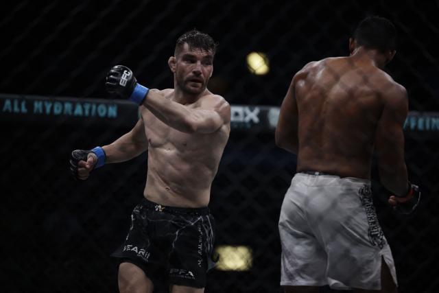 South Africa Adrian Sanchez (L) fights with Brazil Jefferson Pereira (R) during their lightweight bout for the interim title at the Extreme Fighting Championship (EFC) Matchups in Cape Town on February 26, 2026. (Photo by GIANLUIGI GUERCIA / AFP)