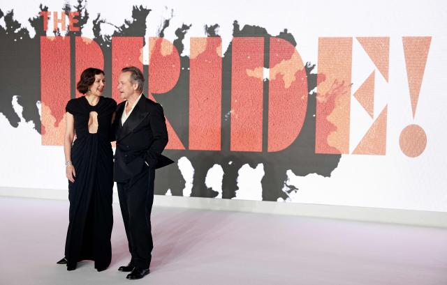 US Writer and Director Maggie Gyllenhaal and US actor Peter Sarsgaard poses upon arrival for the world premiere for the film 'The Bride' in central London on February 26, 2026. (Photo by Brook Mitchell / AFP)