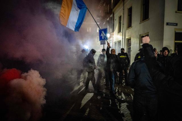 Attendees take part in a gathering by Defend Netherlands in tribute to French far-right activist Quentin Deranque, who died after being attacked on the sidelines of a far-right protest against a La France Insoumise (LFI) event, at the ACU political and cultural centre in Utrecht on February 26, 2026. Deranque, 23, died from head injuries following clashes between radical-left and far-right supporters on the sidelines of a February 12 protest against a politician from the left-wing LFI party in Lyon. (Photo by Josh Walet / ANP / AFP) / Netherlands OUT