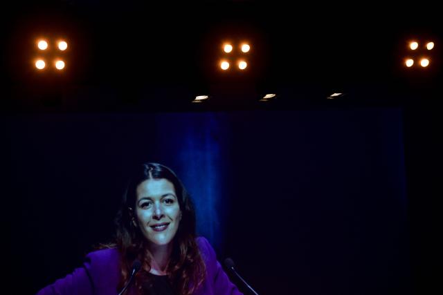 French leftist La France Insoumise (LFI) list candidate for Mayor of Lyon in the 2026 municipal elections, Anais Belouassa-Cherifi, delivers a speech during a campaign rally in Lyon on February 26, 2026. (Photo by OLIVIER CHASSIGNOLE / AFP)