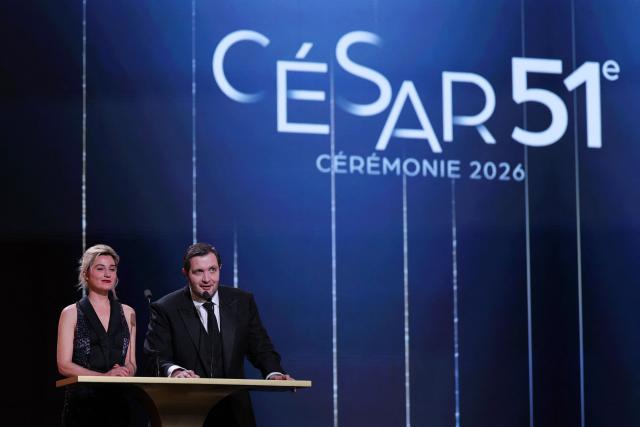 French actress Nina Meurisse (L) and French actor Karim Leklou deliver a speech during the 51st edition of the Cesar Film Awards ceremony at the Olympia venue in Paris on February 26, 2026. (Photo by Thomas SAMSON / AFP)