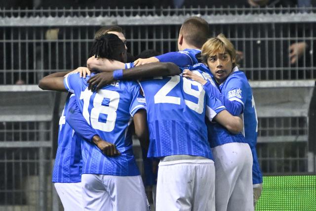 Genk's players celebrate after RC Genk's Nigerian forward #14 Yira Sor score his team's first goal during the UEFA Europa League knockout round play-off second leg football match between KRC Genk and GNK Dinamo Zagreb at the Cegeka Arena stadium in Genk on February 26, 2026. (Photo by Johan Eyckens / Belga / AFP) / Belgium OUT