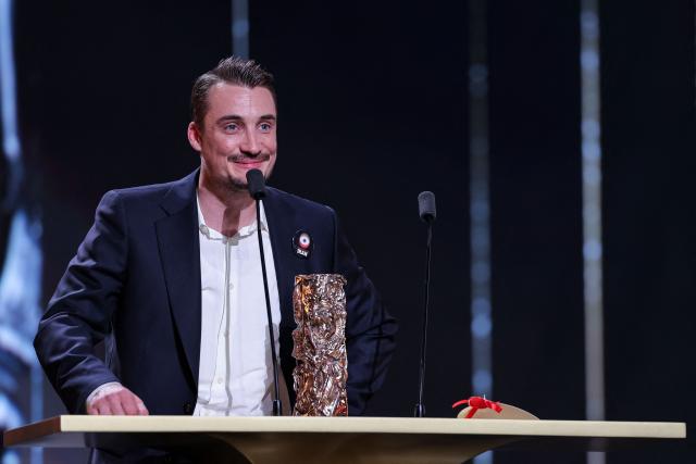 French actor Pierre Lottin delivers a speech with his trophy after winning the Best Actor in a Supporting Role award for The The Stranger (L'Etranger) during the 51st edition of the Cesar Film Awards ceremony at the Olympia venue in Paris on February 26, 2026. (Photo by Thomas SAMSON / AFP)