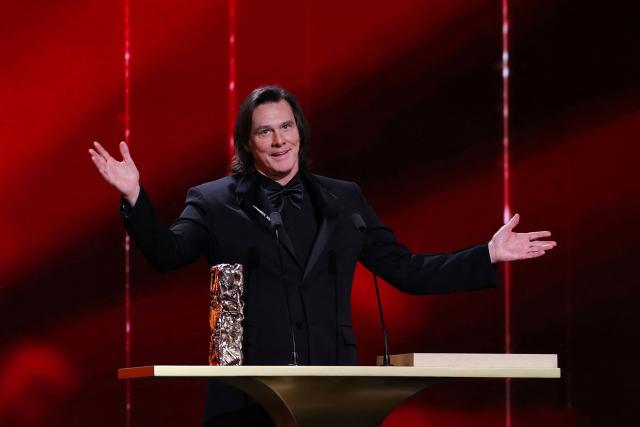 TOPSHOT - Canadian actor Jim Carrey - who receives a honorary Cesar award - acknowledges the audience during the 51st edition of the Cesar Film Awards ceremony at the Olympia venue in Paris on February 26, 2026. (Photo by Thomas SAMSON / AFP)