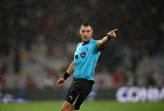 Uruguayan referee Gustavo Tejera gestures during the Recopa Sudamericana second leg final football match between Brazil's Flamengo and Argentina's Lanus at the Maracana Stadium in Rio de Janeiro, Brazil, on February 26, 2026. (Photo by MAURO PIMENTEL / AFP)