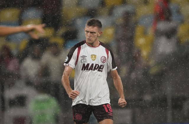 Lanus' midfielder #19 Rodrigo Castillo celebrates scoring his team's first goal during the Recopa Sudamericana second leg final football match between Brazil's Flamengo and Argentina's Lanus at the Maracana Stadium in Rio de Janeiro, Brazil, on February 26, 2026. (Photo by MAURO PIMENTEL / AFP)