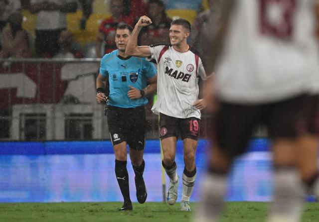 Lanus' midfielder #19 Rodrigo Castillo celebrates after scoring his team's first goal during the Recopa Sudamericana second leg final football match between Brazil's Flamengo and Argentina's Lanus at the Maracana Stadium in Rio de Janeiro, Brazil, on February 26, 2026. (Photo by MAURO PIMENTEL / AFP)