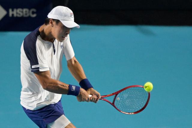 USA's Brandon Nakashima returns the ball to Monaco's Valentin Vacherot during the 2026 Mexico ATP 500 Tennis Open men's singles match at the Arena GNP Seguros in Acapulco, Guerrero State, Mexico, on February 26, 2026. (Photo by Alfredo ESTRELLA / AFP)