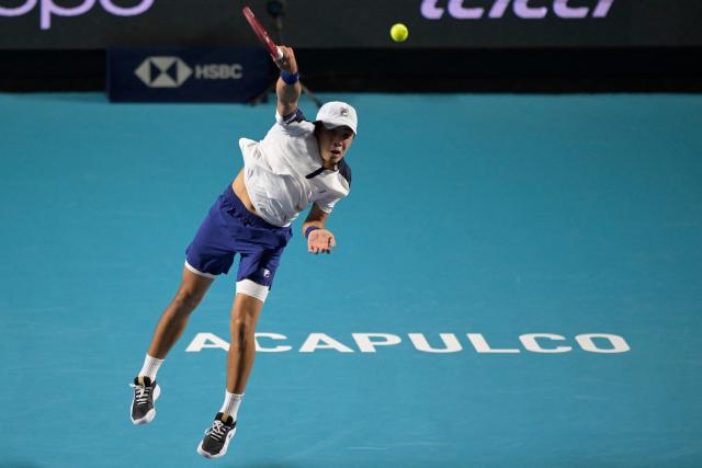 USA's Brandon Nakashima serves to Monaco's Valentin Vacherot during the 2026 Mexico ATP 500 Tennis Open men's singles match at the Arena GNP Seguros in Acapulco, Guerrero State, Mexico, on February 26, 2026. (Photo by Alfredo ESTRELLA / AFP)