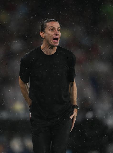 Flamengo's head coach Filipe Luis gestures during the Recopa Sudamericana second leg final football match between Brazil's Flamengo and Argentina's Lanus at the Maracana Stadium in Rio de Janeiro, Brazil, on February 26, 2026. (Photo by MAURO PIMENTEL / AFP)