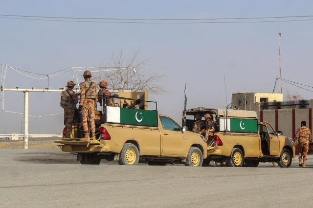 Pakistani soldiers patrol near the PakistanAfghanistan border crossing in Chaman on February 27, 2026, following overnight cross-border fighting between the two countries. Pakistan bombed major cities in Afghanistan including the capital Kabul on February 27, with Islamabad's defence minister declaring the neighbours at "open war" following months of tit-for-tat clashes. AFP journalists in Kabul and Kandahar heard blasts and jets overhead, as Pakistan launched air strikes on the Afghan capital and southern power base of the Taliban authorities. (Photo by Abdul BASIT / AFP)