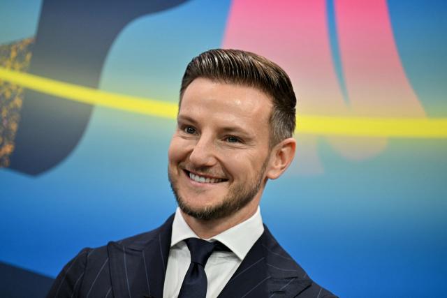 UEFA Foundation for Children ambassador and former Sevilla midfielder, Ivan Rakitic reacts as he arrives to take part in the 2025-2026 UEFA Champions League round of 16, quarter-final and semi-final draw at the House of European Football in Nyon, western Switzerland on February 27, 2026. (Photo by Harold CUNNINGHAM / AFP)