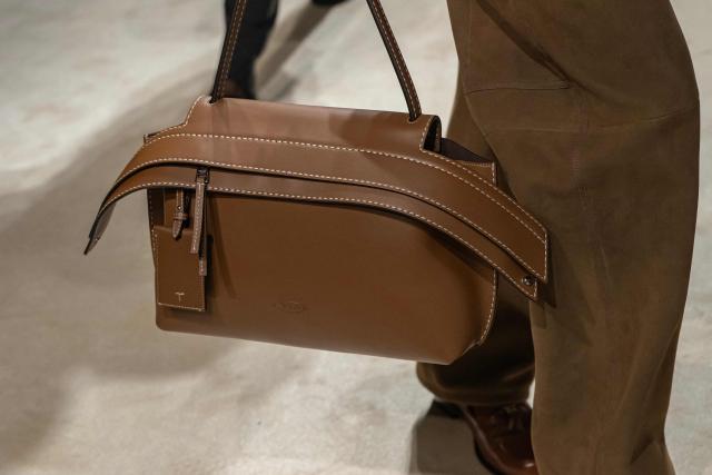 A model presents a creation during the Tod's collection show at Milan's Fashion Week Womenswear Fall / Winter 2026/2027, in Milan on February 27, 2026. (Photo by MIGUEL MEDINA / AFP)