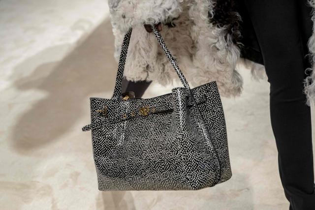 A model presents a creation during the Tod's collection show at Milan's Fashion Week Womenswear Fall / Winter 2026/2027, in Milan on February 27, 2026. (Photo by MIGUEL MEDINA / AFP)