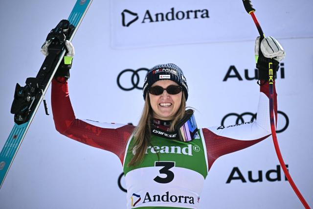 Second-placed Austria's Nina Ortlieb celebrates on the podium of the women's downhill race, part of the FIS Alpine Ski World Cup 2025-2026 in Soldeu, Andorra on February 26, 2026. (Photo by Lionel BONAVENTURE / AFP)