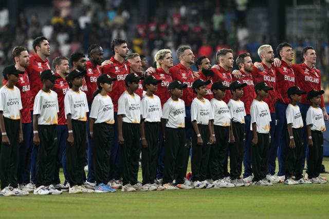England's players stand for their national anthem at the start of the 2026 ICC Men's T20 Cricket World Cup Super Eights match between England and New Zealand at the R Premadasa Stadium in Colombo on February 27, 2026. (Photo by Ishara S. KODIKARA / AFP)