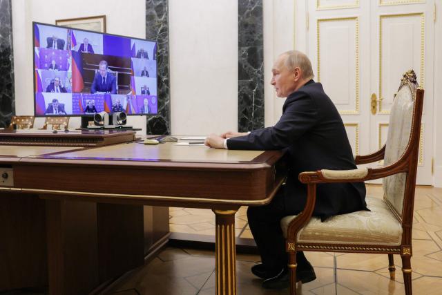In this pool photograph distributed by the Russian state agency Sputnik, Russia's President Vladimir Putin chairs a Security Council meeting via videolink in Moscow on February 27, 2026. (Photo by Gavriil GRIGOROV / POOL / AFP)